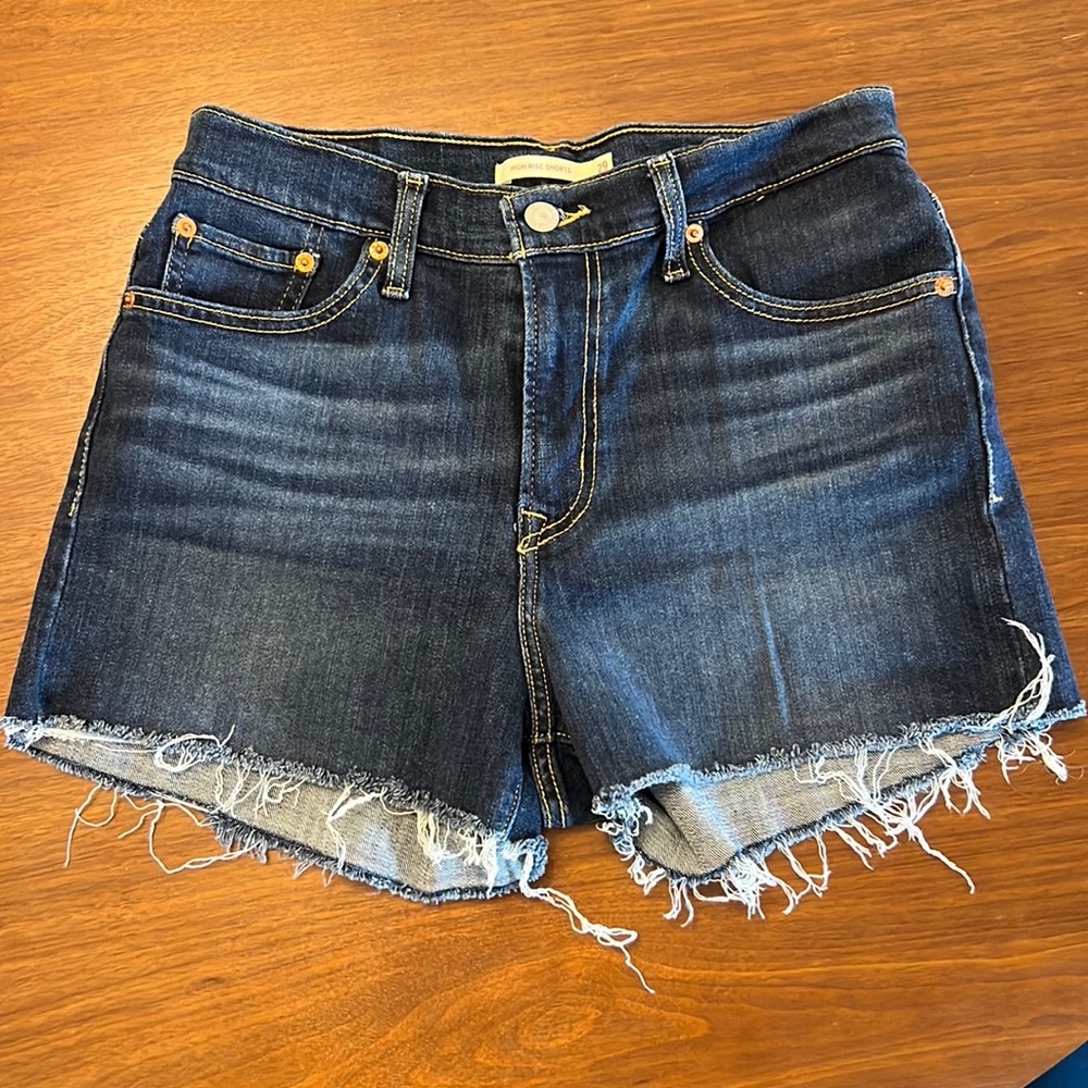 High Rise Levi Shorts in dark denim size 29.